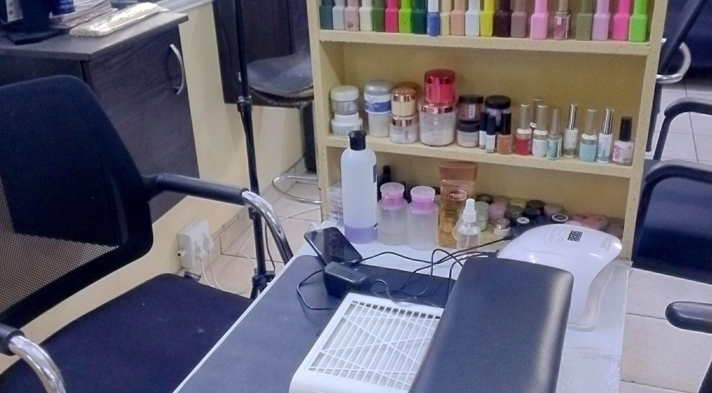 Nail station at Cloud1nails and Beauty Studio, Vanderbijlpark, Gauteng, ZA, with polish colors displayed.