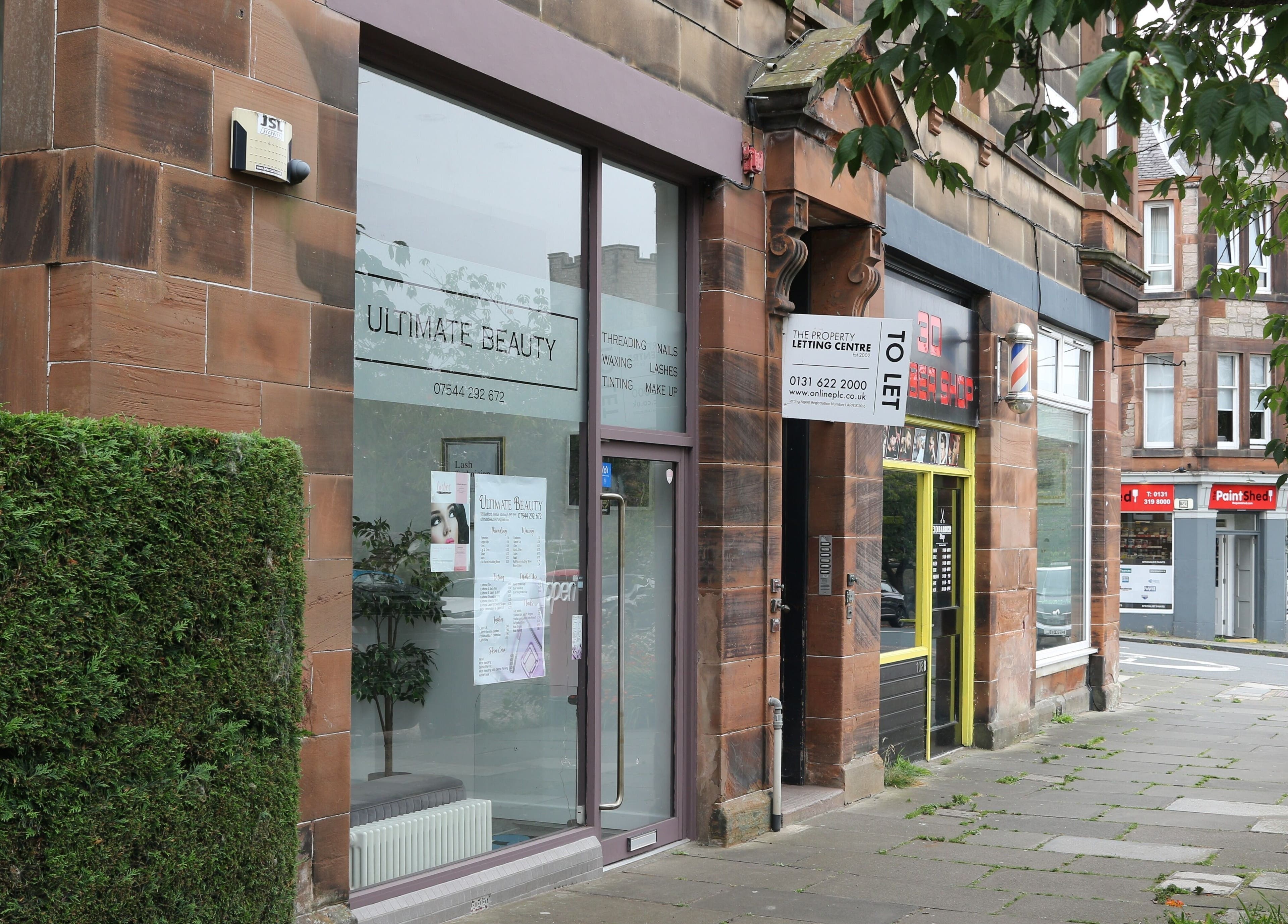 Ultimate Beauty facade in Edinburgh, Scotland, GB with inviting entrance and modern signage.