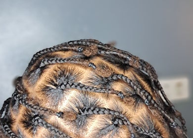 Intricate braided hairstyle crafted by jay_.beauty_esthetics in Point Fortin, TT.