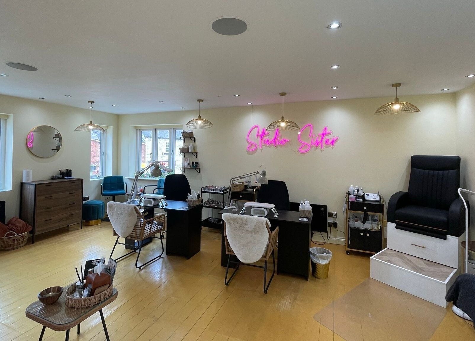 Faces by MR - Wetherby, an inviting salon space in Wetherby, England, GB, featuring modern decor and styling stations.