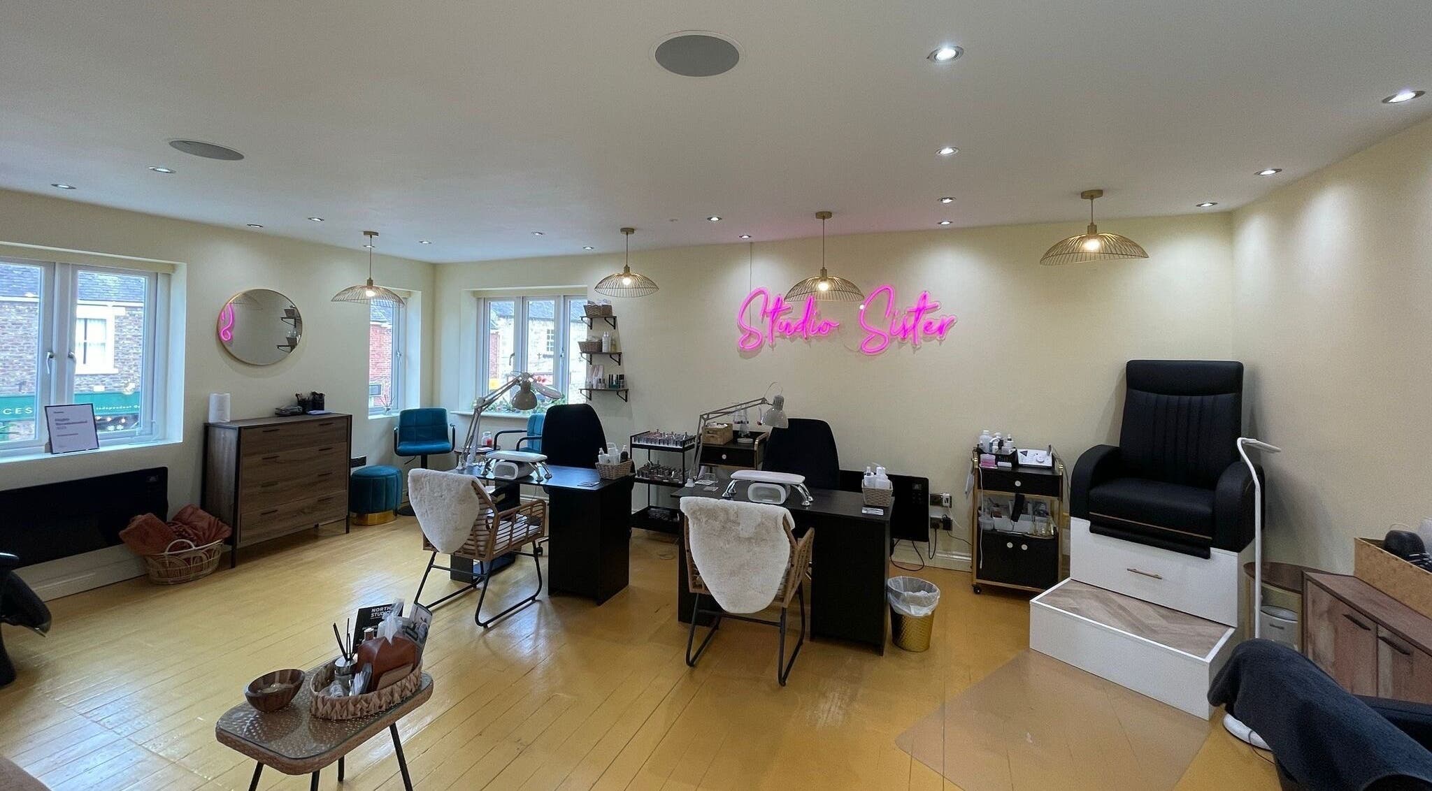 Faces by MR - Wetherby, an inviting salon space in Wetherby, England, GB, featuring modern decor and styling stations.