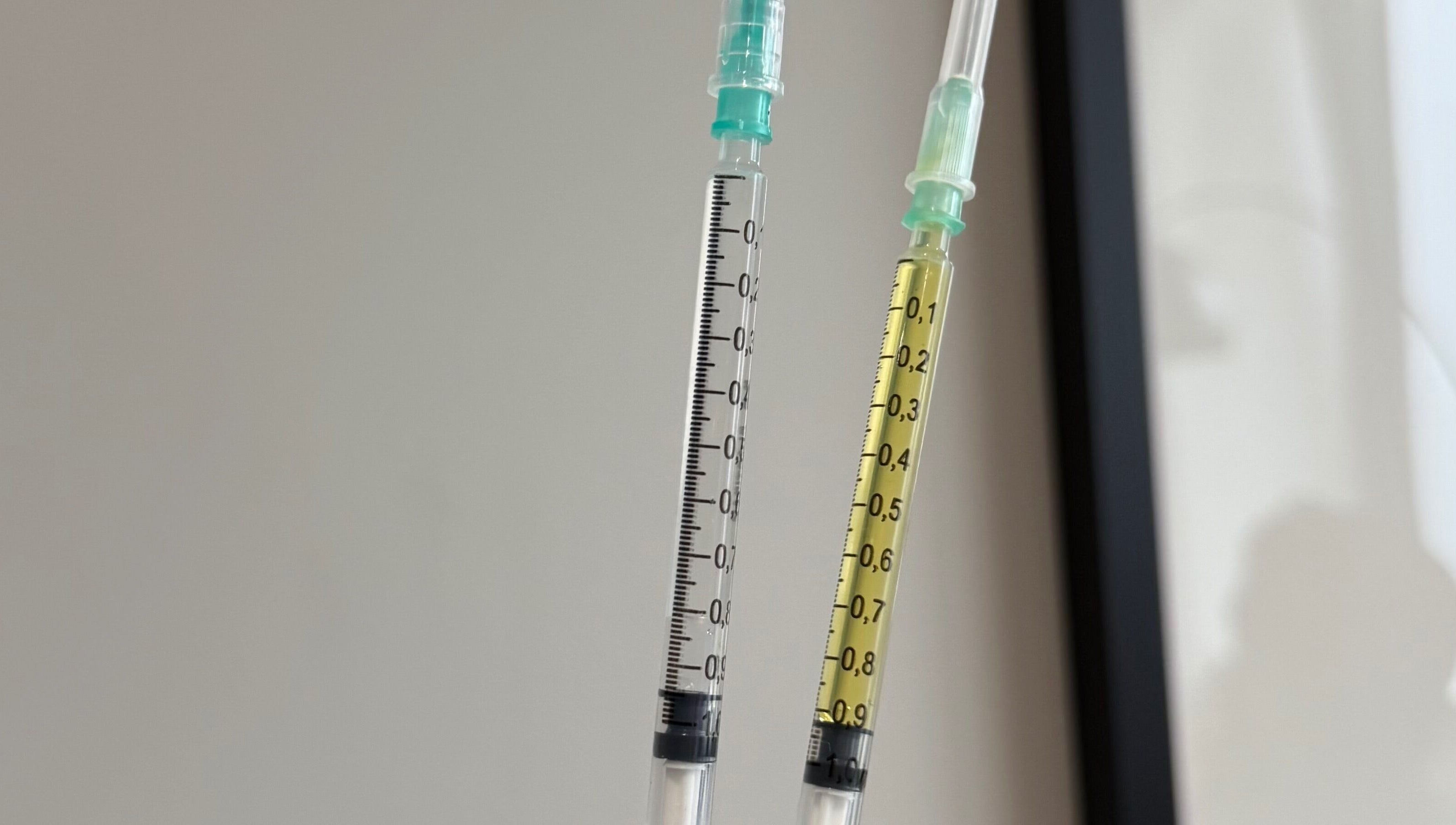 Close-up of syringes at Re.scalp, Birmingham, England, GB showcasing wellness procedures.