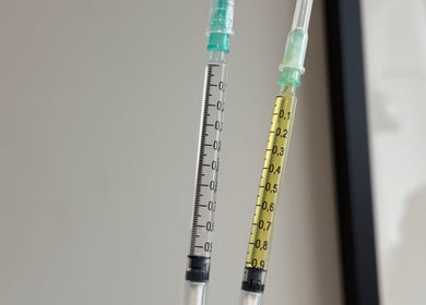 Close-up of syringes at Re.scalp, Birmingham, England, GB showcasing wellness procedures.