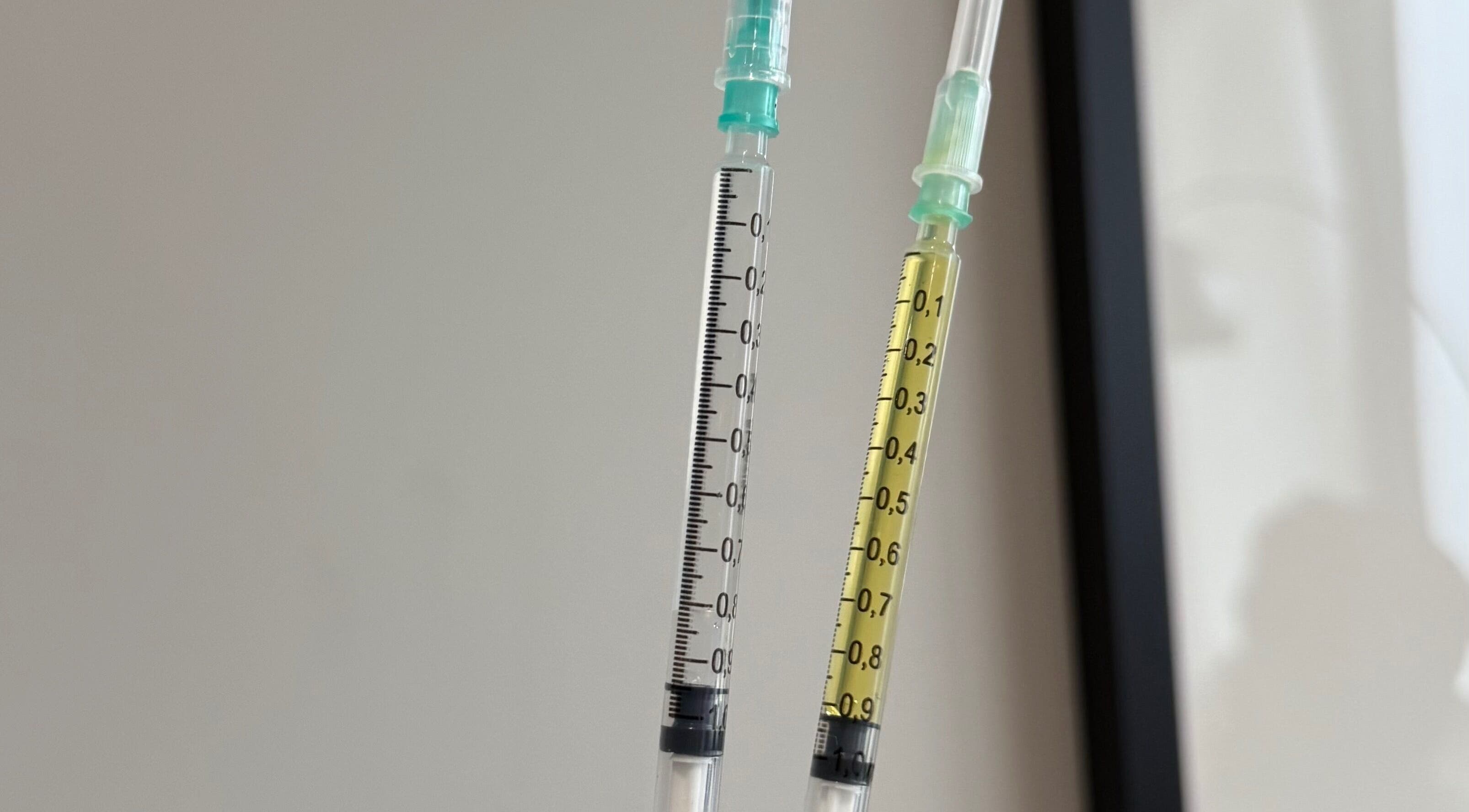 Close-up of syringes at Re.scalp, Birmingham, England, GB showcasing wellness procedures.