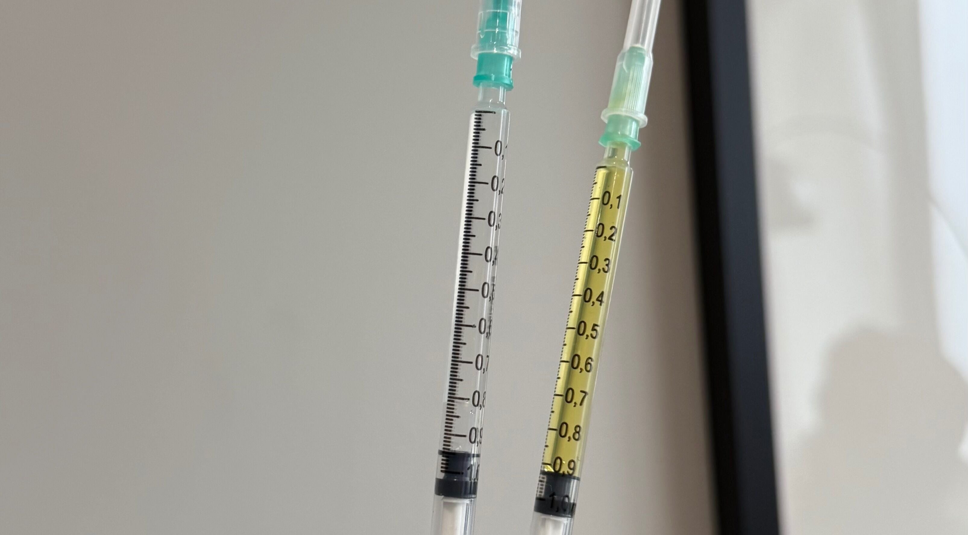 Close-up of syringes at Re.scalp, Birmingham, England, GB showcasing wellness procedures.