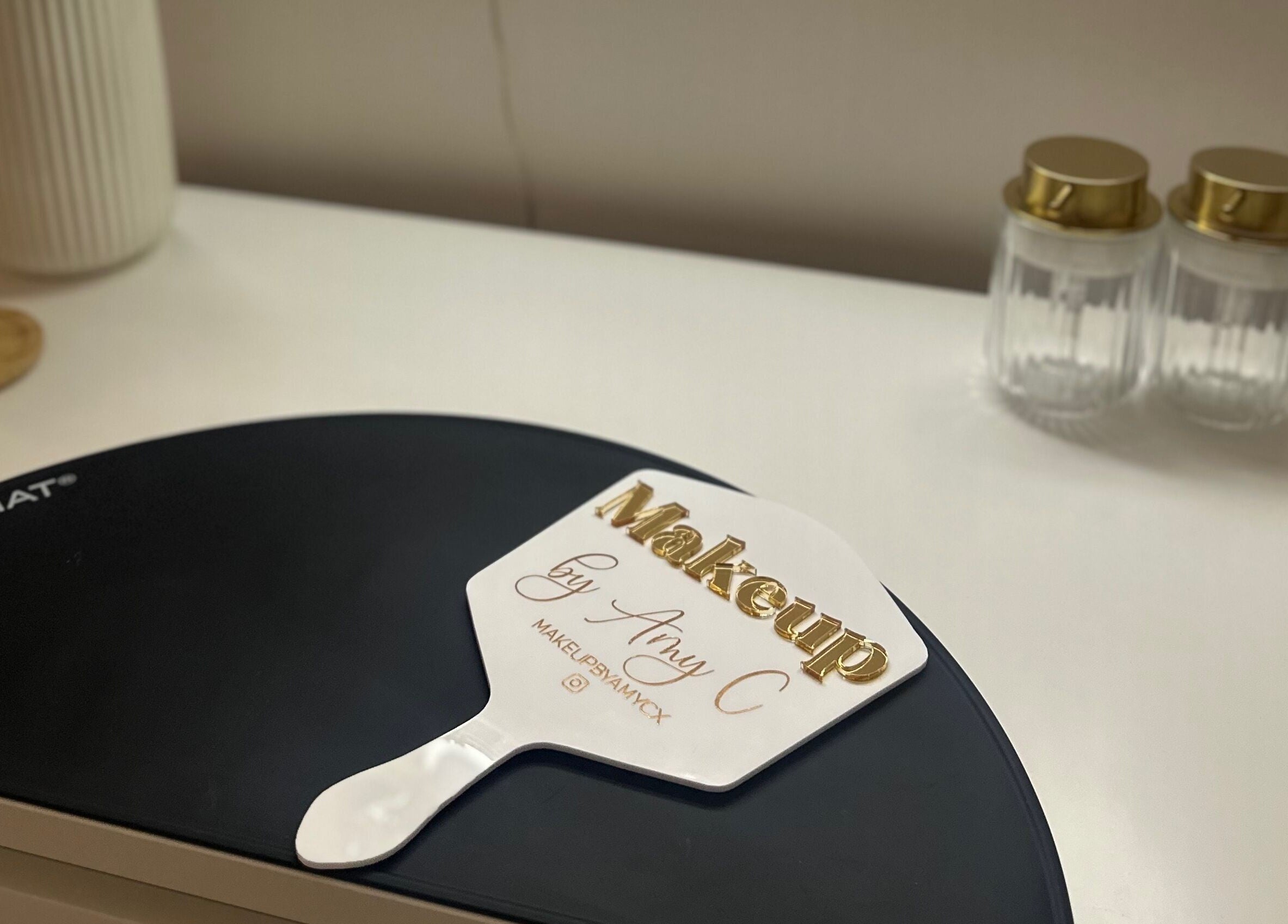 MakeupbyAmyC's personalized beauty mat and jars at East Kilbride, Scotland, GB, showcasing elegance.