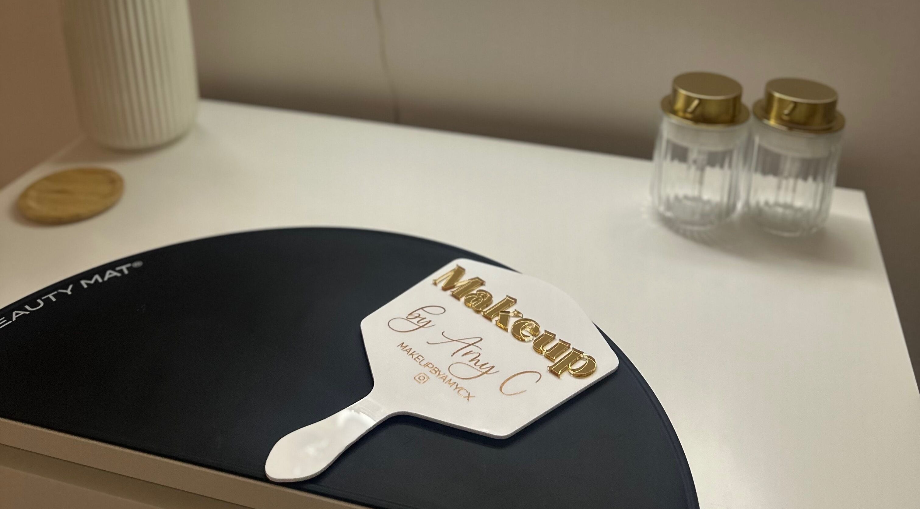 MakeupbyAmyC's personalized beauty mat and jars at East Kilbride, Scotland, GB, showcasing elegance.