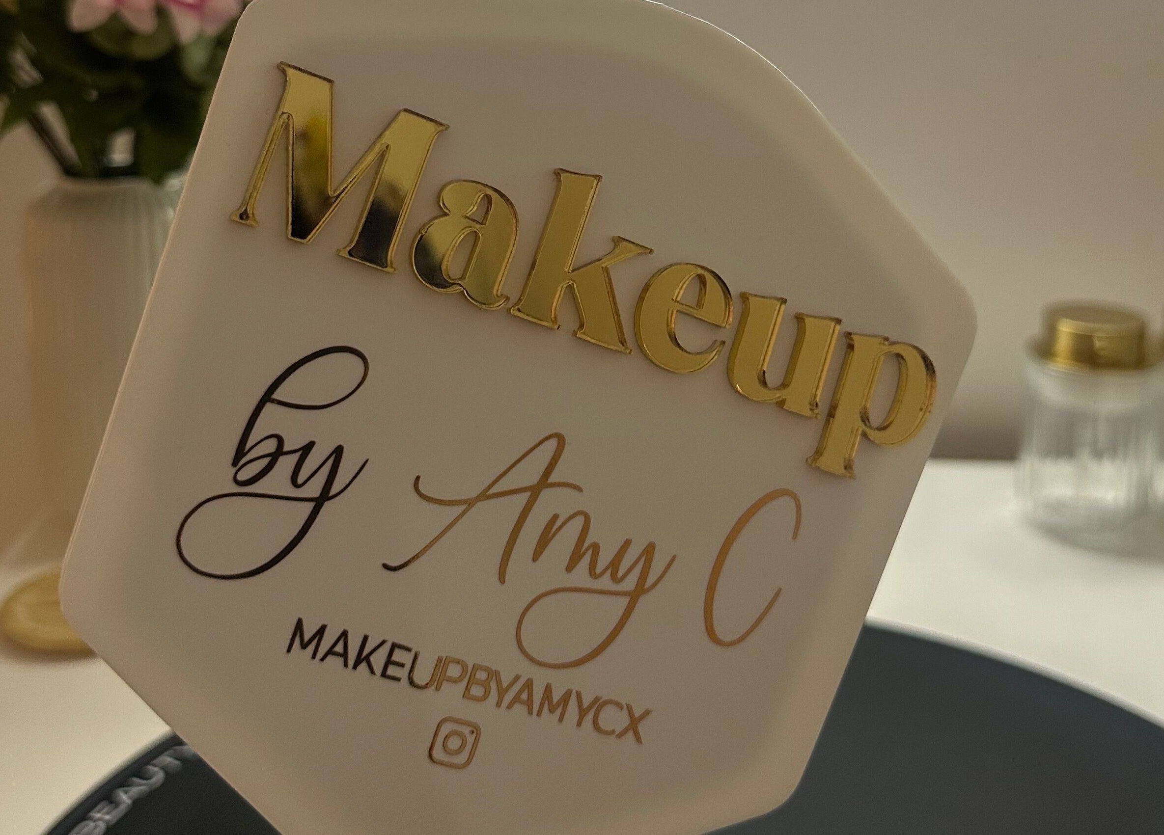 MakeupbyAmyC branding sign in elegant script at venue in East Kilbride, Scotland, GB.
