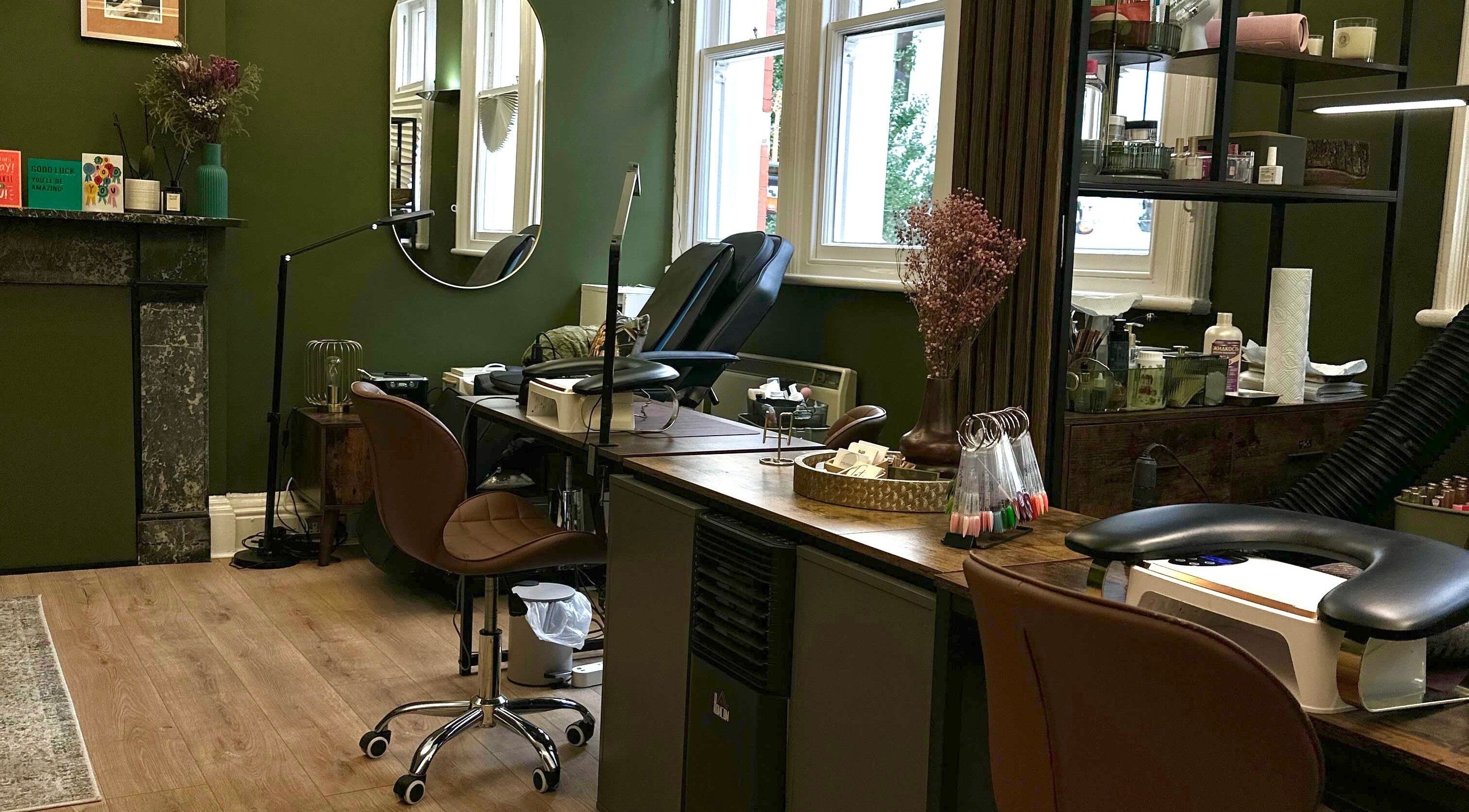Cozy nail studio interior at Olya Fine Nails, Manchester, England, GB. Elegant decor enhances relaxation.