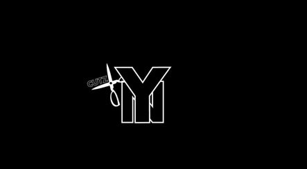 Youngnino's distinct Cutz logo featuring scissors, located in Willemstad, Curaçao, CW.