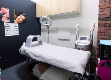 Treatment room at That Organic Salon in Sydney, New South Wales, AU, featuring professional equipment and cozy aesthetics.