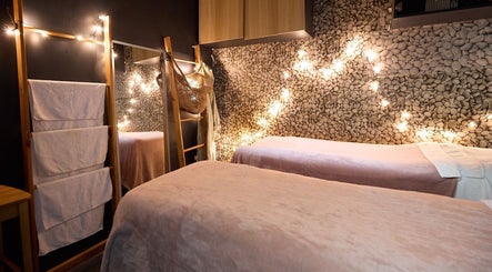 Cozy treatment room at That Organic Salon, Sydney, New South Wales, AU with ambient lighting and relaxing decor.