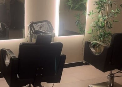 Luxurious salon setup at Ms Velvet's Waxing in Dudley, England, GB with sleek chairs and stylish mirrors.