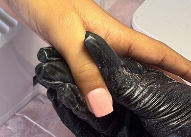Professional nail enhancement at NailswithAmy, Western Cape, Western Cape, ZA. Smooth pink polish application.
