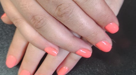 Coral nail manicure at Danni's Den: Beauty Refined in Wellingborough, England, GB.