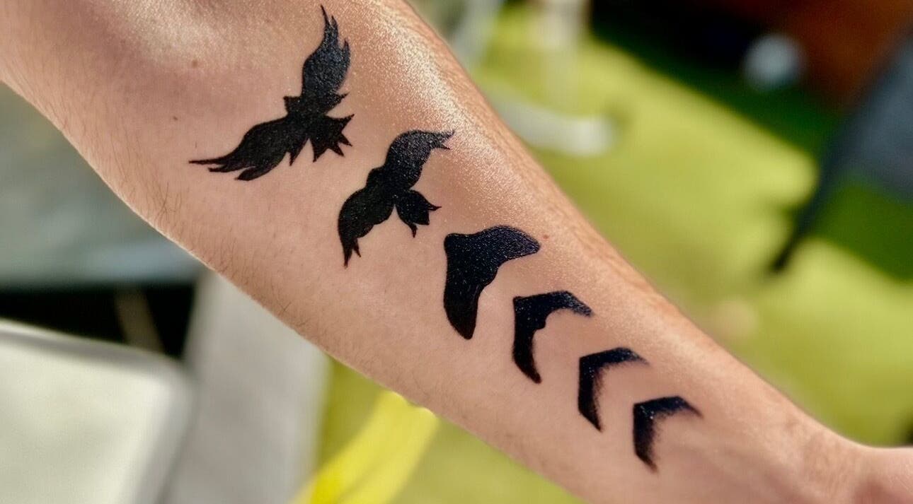 Birds tattoo art on forearm from Taisia's Ink Lab, Watford, England, GB.