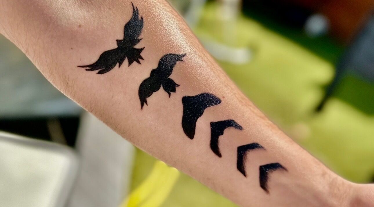 Birds tattoo art on forearm from Taisia's Ink Lab, Watford, England, GB.