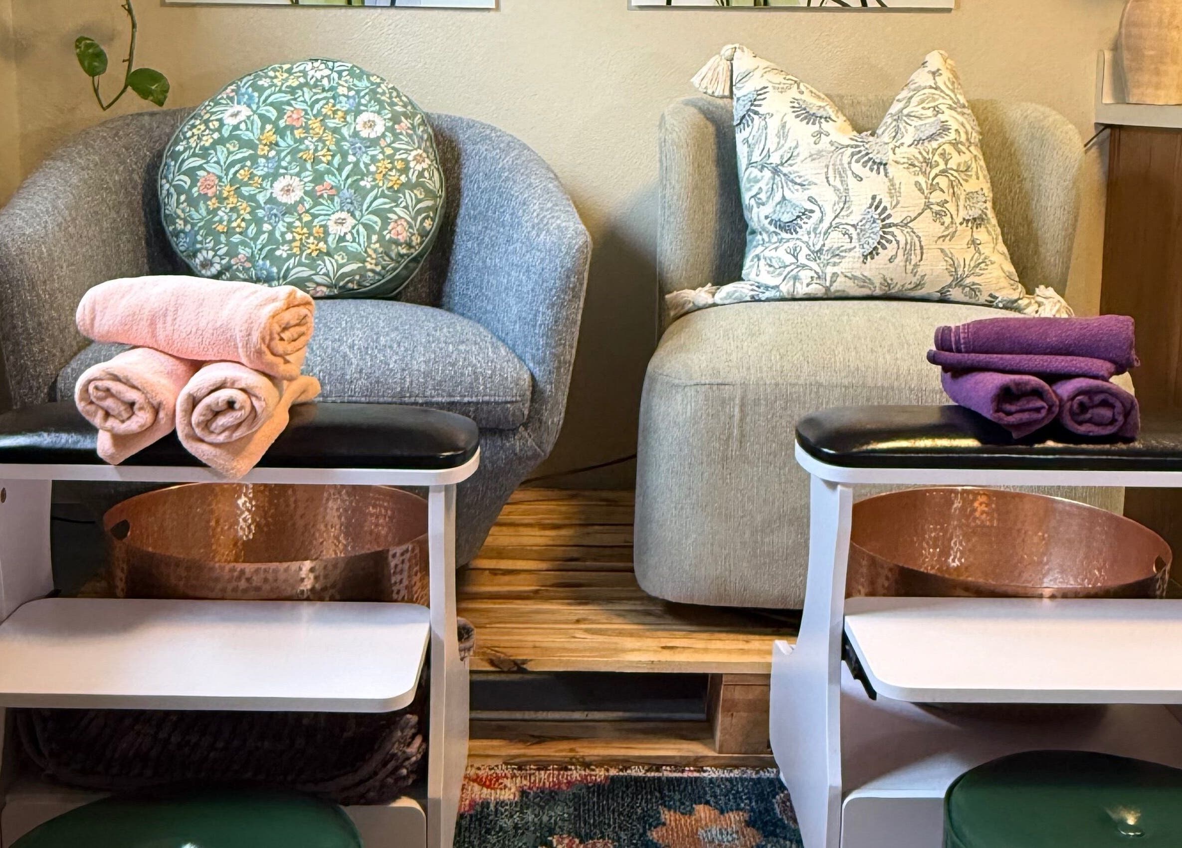 Elegant spa seating with plush towels at Nails By Nikki, Nederland, Colorado, US.