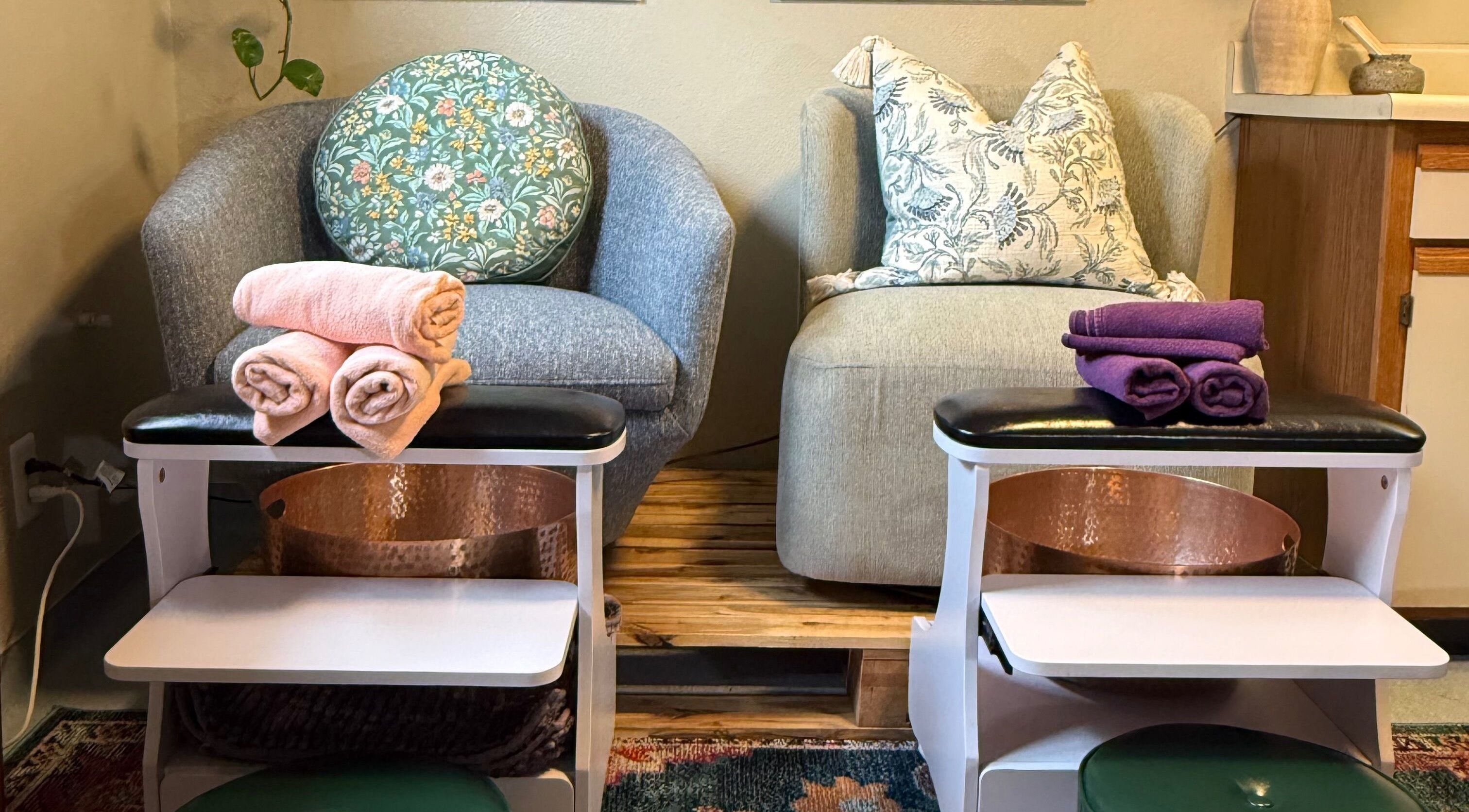Elegant spa seating with plush towels at Nails By Nikki, Nederland, Colorado, US.