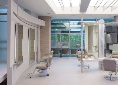 Modern salon interior at HE:ARTS Dosan in Seoul, 서울특별시, KR, featuring stylish chairs and bright windows.