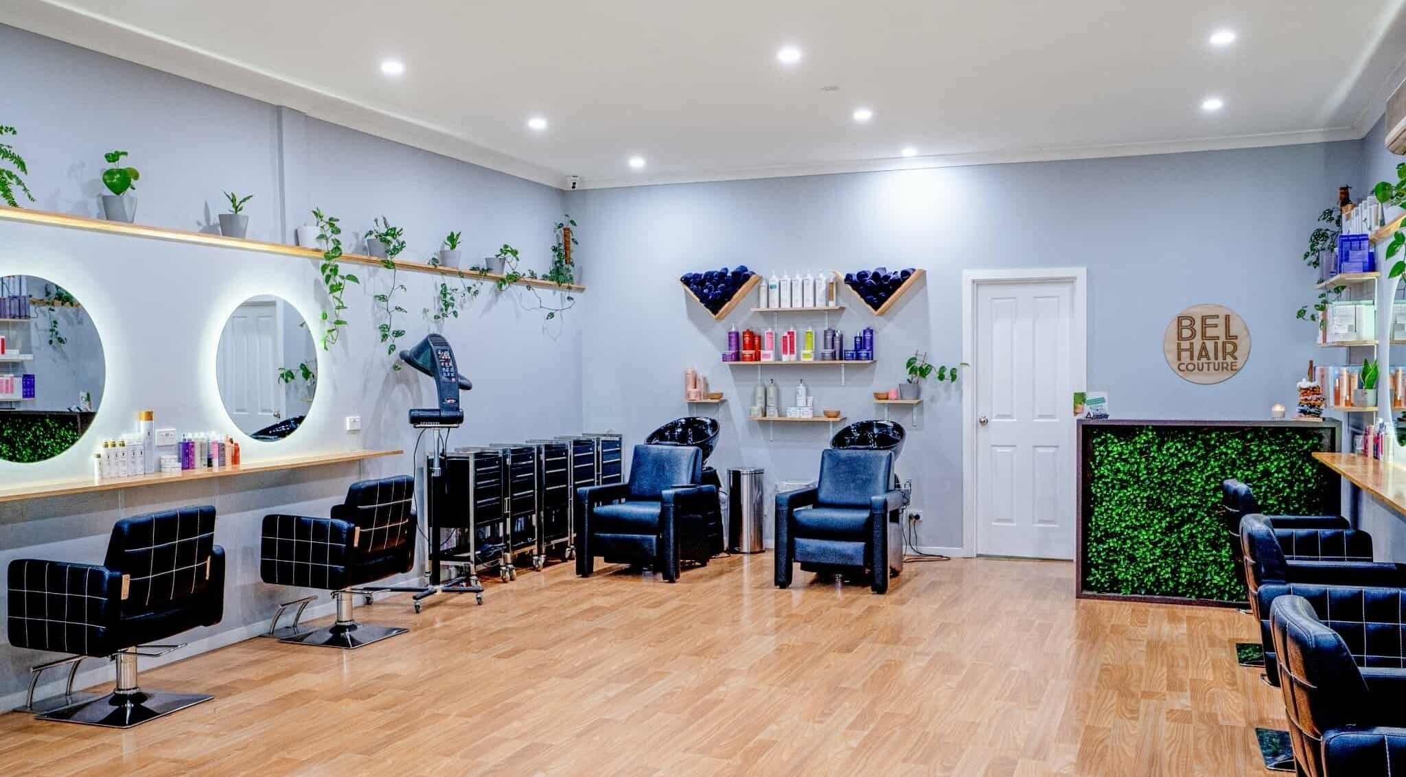 Modern salon interior at Stephanie Jade Makeup Artistry, Melbourne, Victoria, AU, featuring sleek chairs and mirrors.