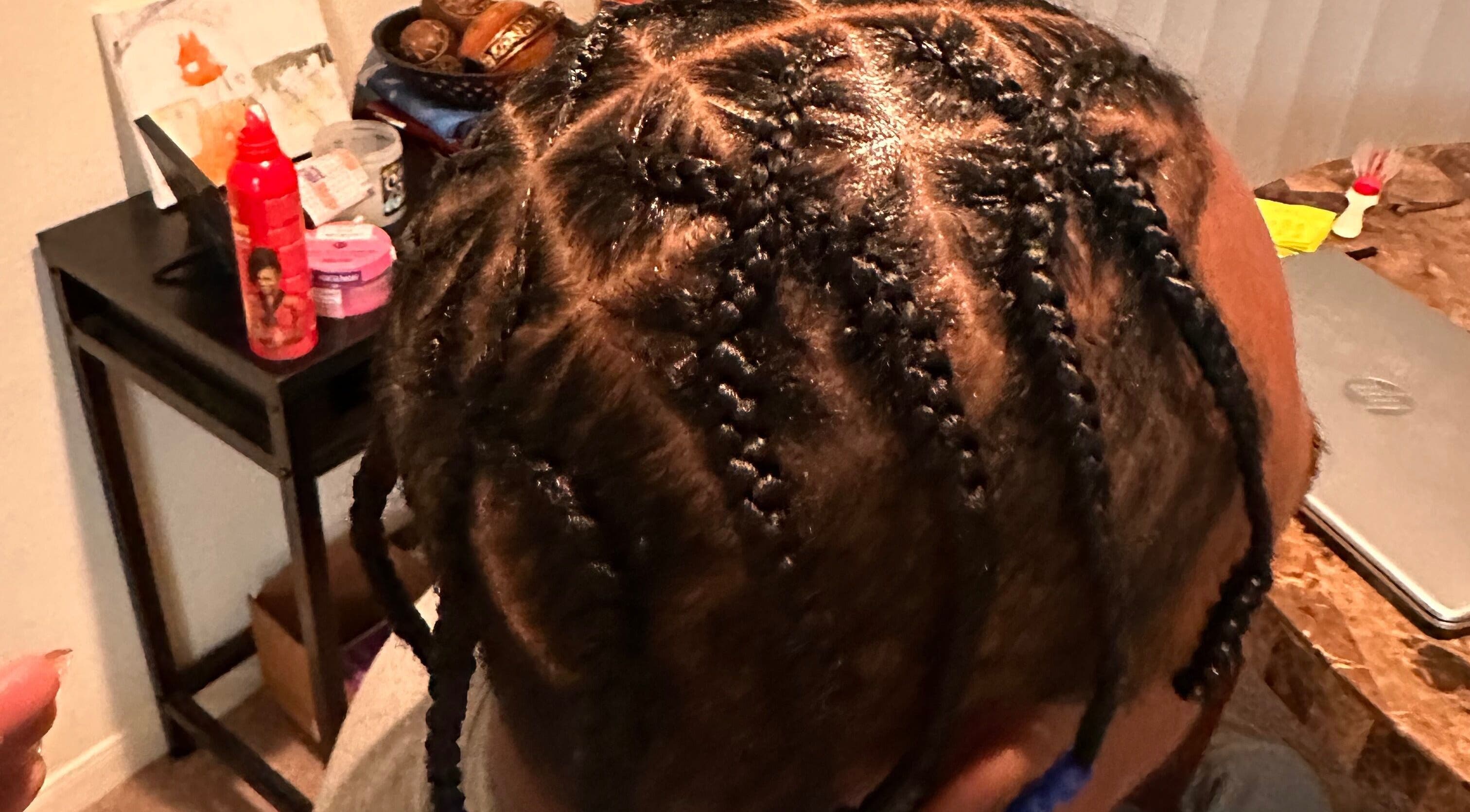 Intricate braids styled at Natural Braids By Val in Indianapolis, Indiana, US.
