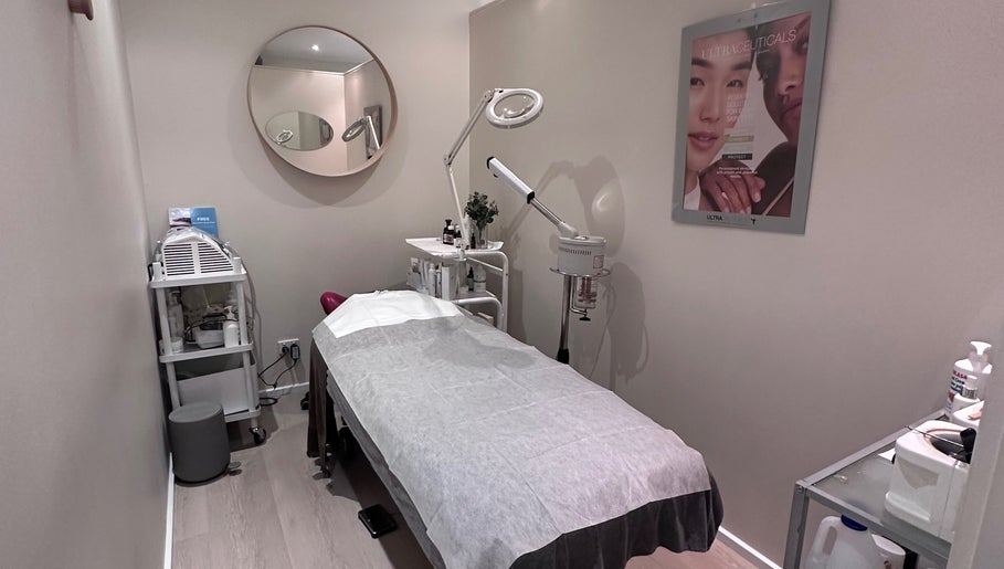 Modern treatment room at Petra Pearse Brows, Cremorne, New South Wales, AU, showcasing a comfortable table and tools.
