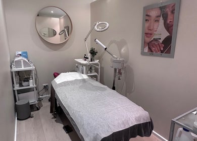 Modern treatment room at Petra Pearse Brows, Cremorne, New South Wales, AU, showcasing a comfortable table and tools.
