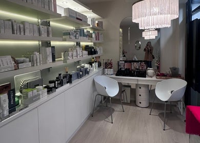 Chic interior of Petra Pearse Brows, Cremorne, New South Wales, AU, showcasing products and elegant seating.