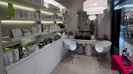 Chic interior of Petra Pearse Brows, Cremorne, New South Wales, AU, showcasing products and elegant seating.
