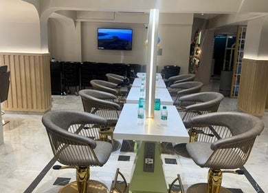 Stylish salon interior at Ruva, Mumbai, Maharashtra, IN, featuring elegant seating and modern design.
