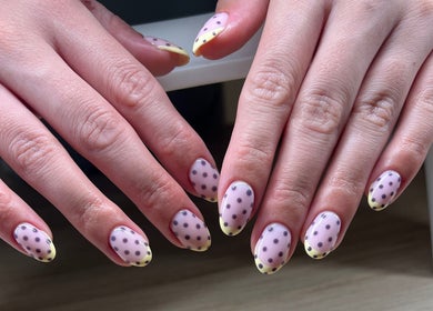Elegant polka dot nail design at Serene Mani's in Stevenage, England, GB.