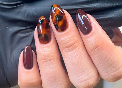 Tortoise shell nail art at Serene Mani's in Stevenage, England, GB. Perfectly polished and detailed design.