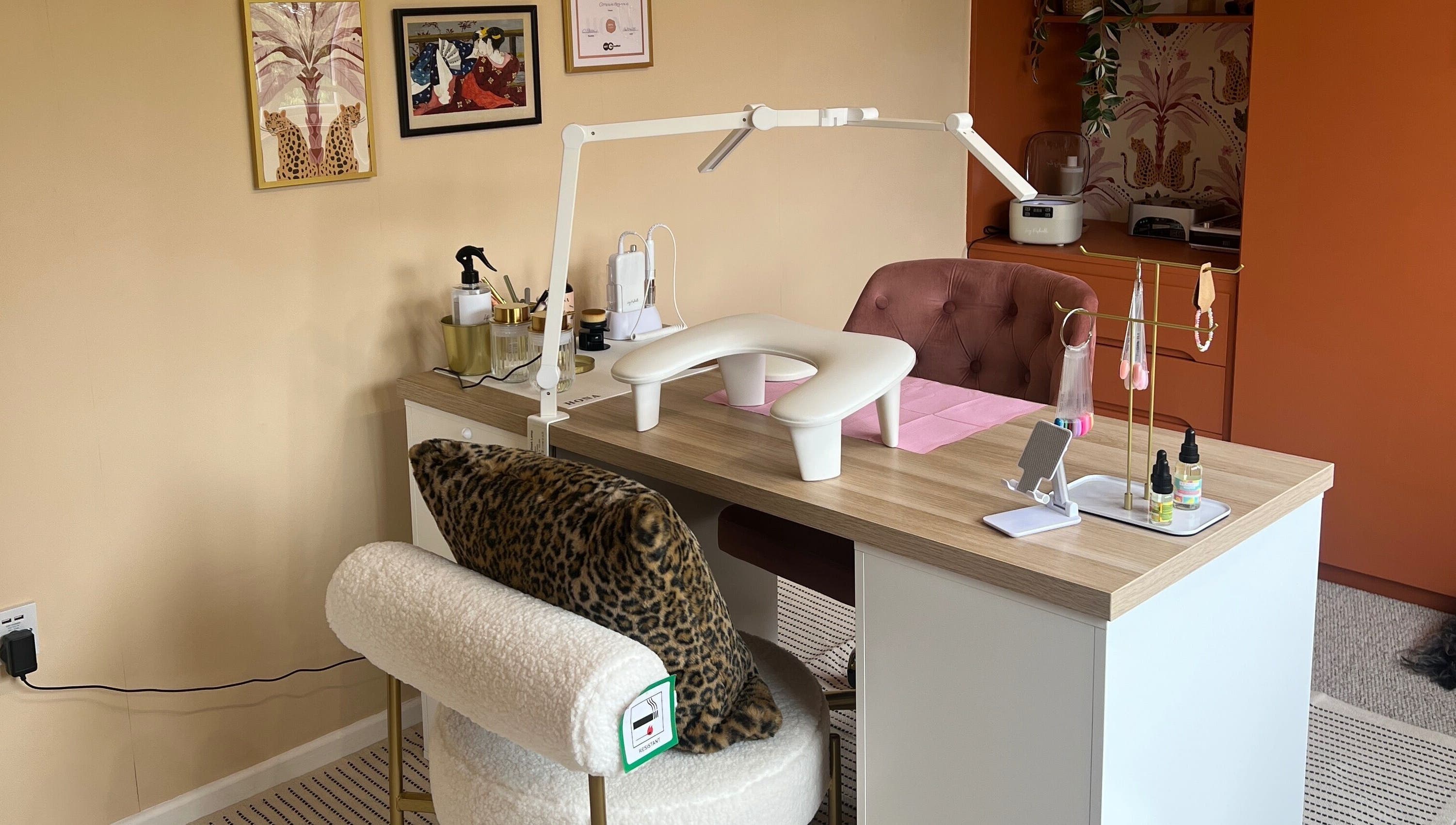 Elegant nail workspace at Serene Mani’s, Stevenage, England, GB, showcasing stylish decor and comfy seating.