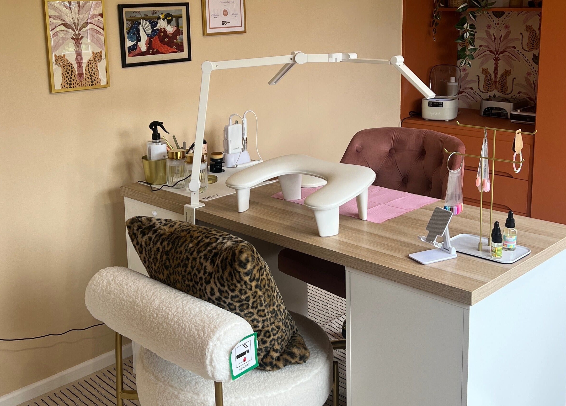 Elegant nail workspace at Serene Mani’s, Stevenage, England, GB, showcasing stylish decor and comfy seating.