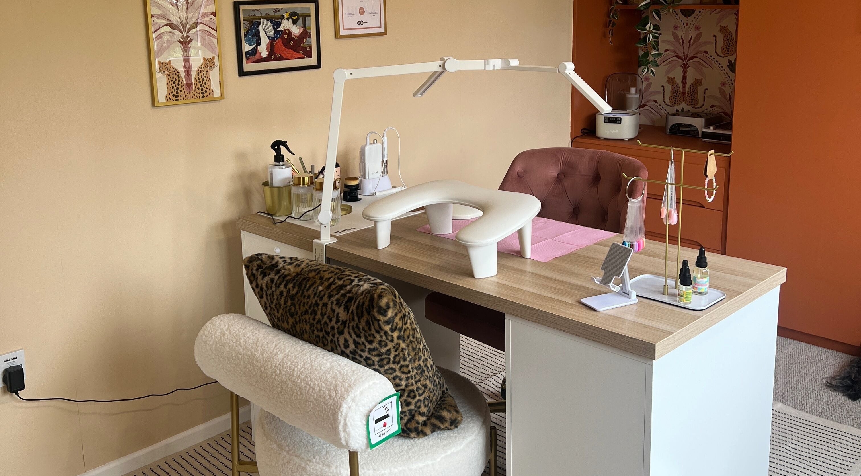 Elegant nail workspace at Serene Mani’s, Stevenage, England, GB, showcasing stylish decor and comfy seating.