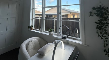 Bright nail station at Kpurenails, Cambridge, Waikato Region, NZ, with cozy chair and natural light.