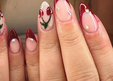 Cherry nail art at Kpurenails, Cambridge, Waikato Region, NZ: vibrant red designs with sparkling gems.
