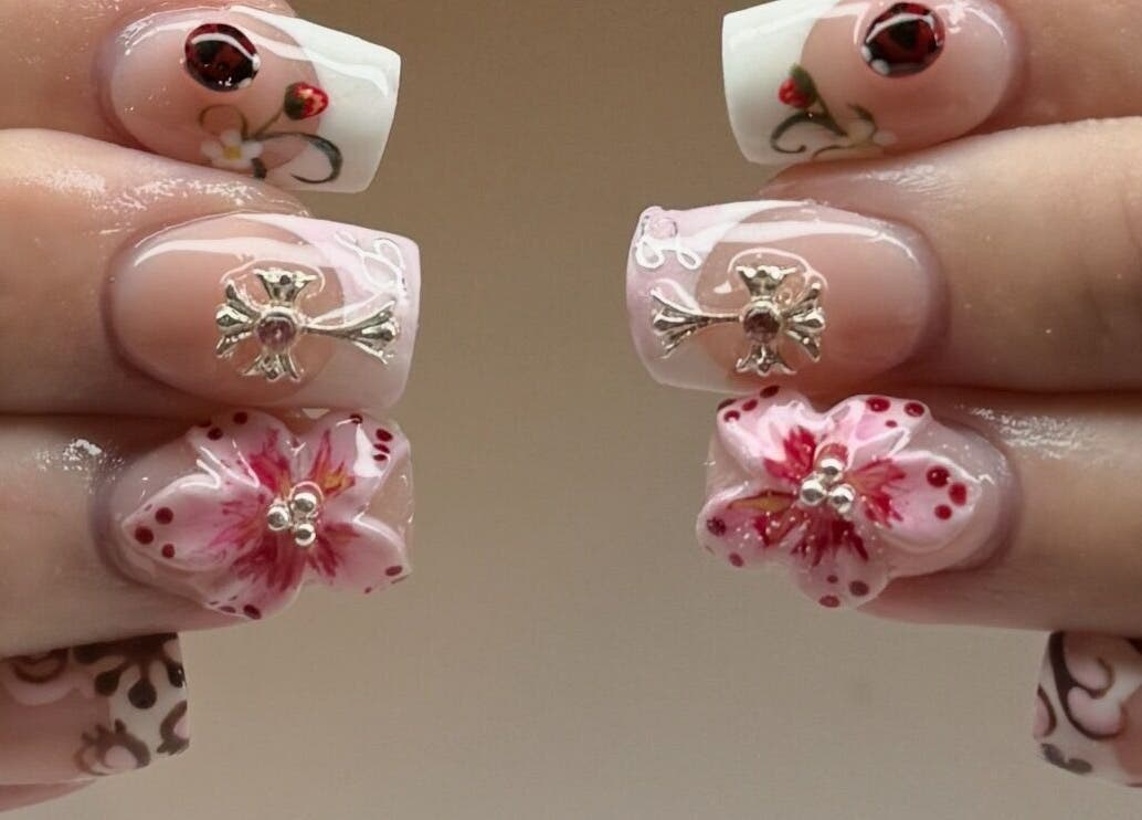 Intricate floral nail art at Kpurenails, Cambridge, Waikato Region, NZ showcasing exquisite design and craftsmanship.