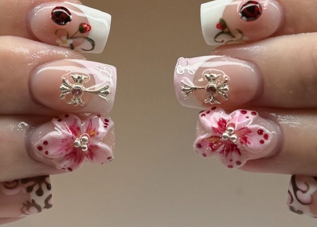 Intricate floral nail art at Kpurenails, Cambridge, Waikato Region, NZ showcasing exquisite design and craftsmanship.