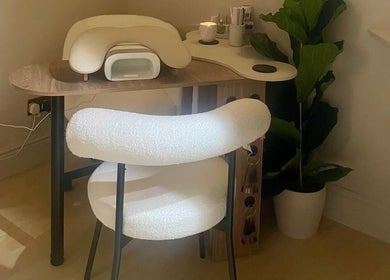 Manicure desk and chair at Bare. Beauty Studio in Bradford, England, GB. A cozy and stylish setup.