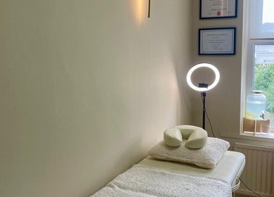 Tranquil treatment room at Bare. Beauty Studio in Bradford, England, GB with soft lighting and cozy decor.