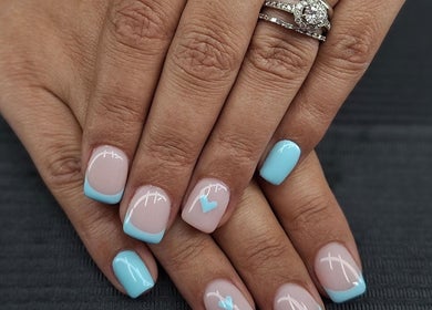 Stylish blue nail art at Mudnmilk nails and beauty, Emanzimtoti, Kwazulu-natal, ZA.