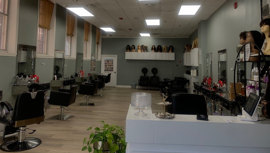 Elegant salon interior at Styles in Haverhill, Massachusetts, US featuring modern styling chairs and decor.