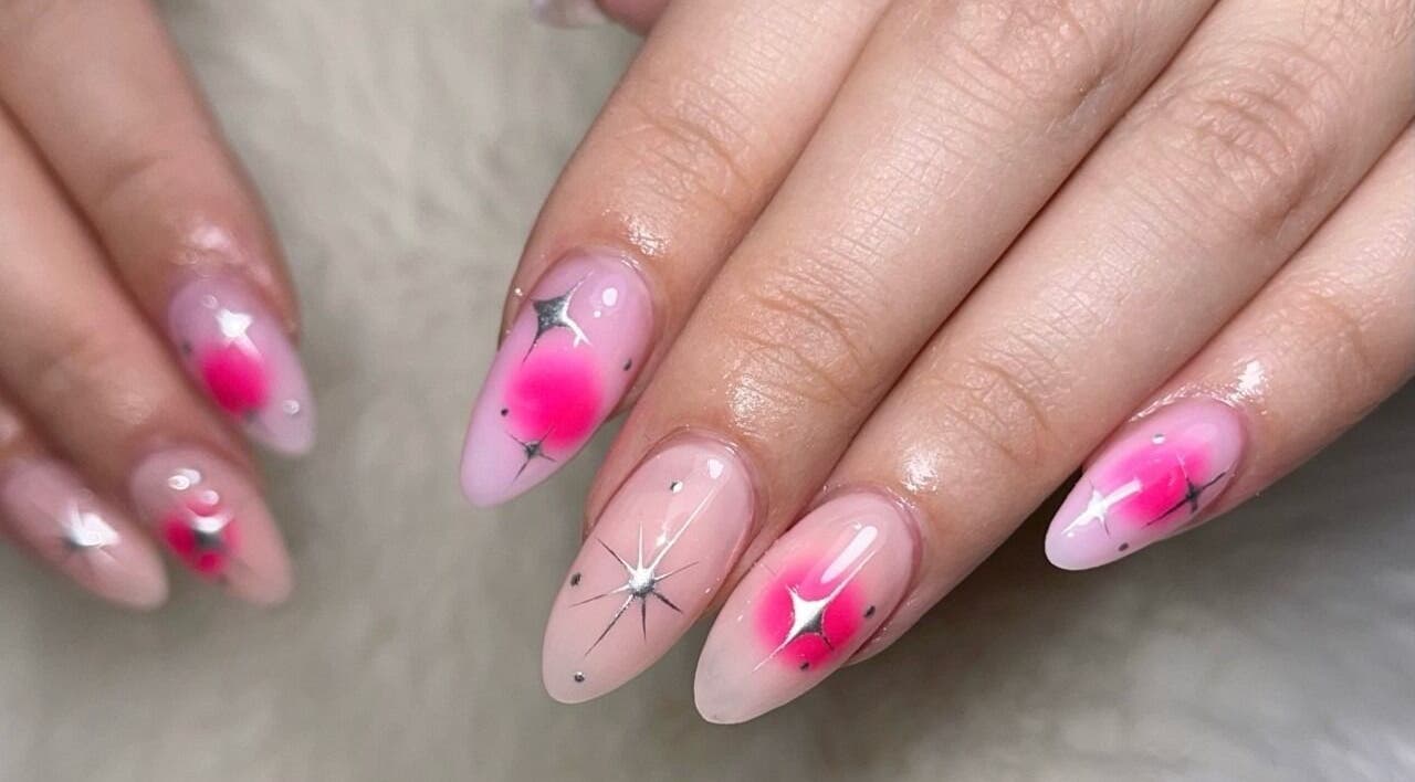 Pink and silver star nail art at Gentle Nails in Winnipeg, Manitoba, CA.
