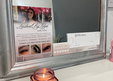 Lashed By Lilya venue in Southend-on-sea showcases a framed promotional flyer and gift certificate.