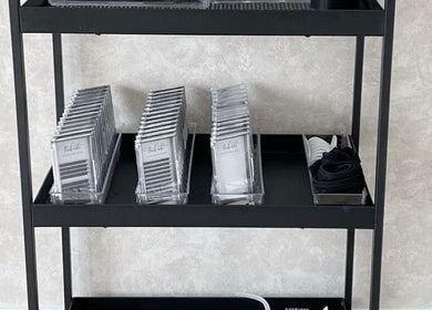 Organized beauty supplies on shelves at Browcandylondon, Milton Keynes, England, GB.
