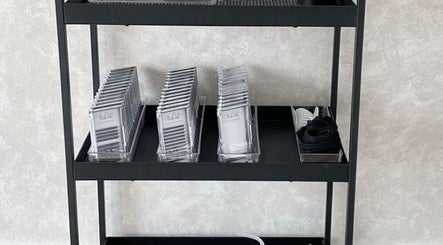 Organized beauty supplies on shelves at Browcandylondon, Milton Keynes, England, GB.
