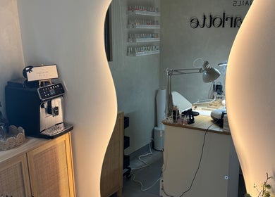 Elegant interior of Nails By Charlotte, featuring manicure station in Dubai, Dubai, AE.