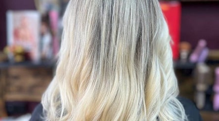 Blonde hair styled with soft waves at Persepolis Unisex Salon, London, England, GB.